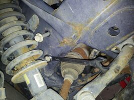 Frame rail bracket lower bolt.jpg